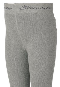 Leggings grigi in maglia con una texture a coste, dotati di una vita morbida con un sottile marchio nella parte superiore.