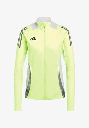 Helle gelbe Sportjacke mit Reißverschluss vorne, grauen Akzenten, schwarzen Streifen auf den Schultern und Mesh-Seitenpaneelen für Belüftung.