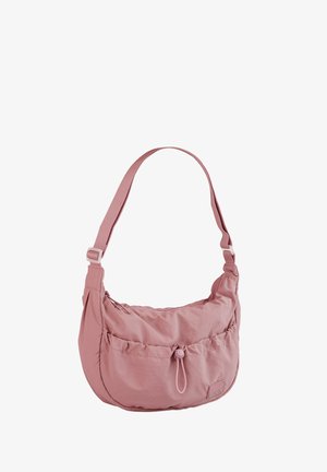 Pink nylon shoulder bag with an adjustable strap. Features a gathered design, front pocket with a drawstring closure, and branded patch.