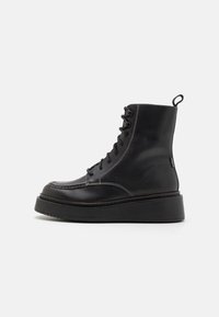 Levi's® Stivaletti con plateau - black