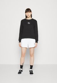 Calvin Klein Jeans MONOLOGO REGULAR CREWNECK - Sweatshirt - black