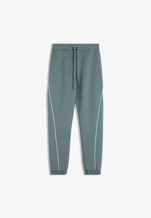Türkise Jogginghosen aus weichem Stoff im taillierten Design, mit weißen Seitenstreifen, elastischen Bündchen und einem Kordelzugbund.