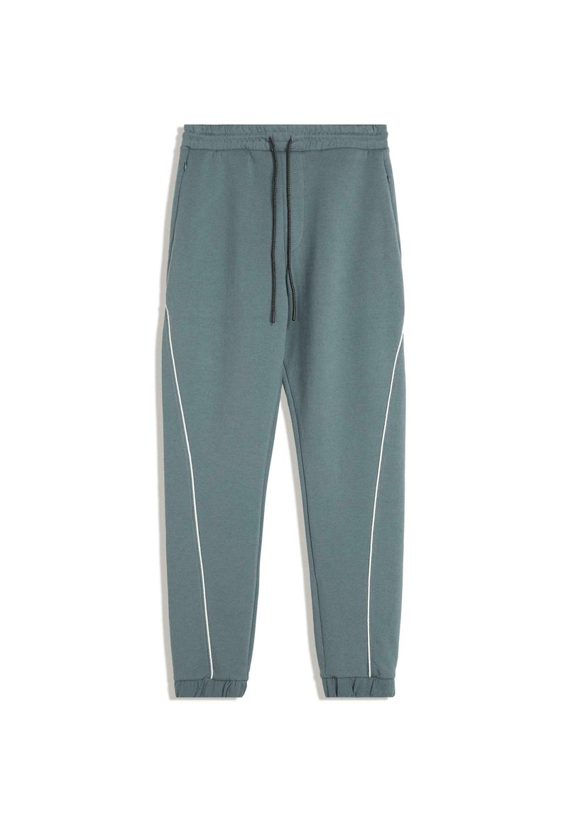 Teal sweatpants i mjukt material, med en taperad design, vita sidostreck, elastiska muddar och dragsko i midjan.