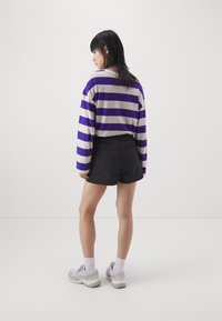 Puma CLASSICS LINE - Shorts - black