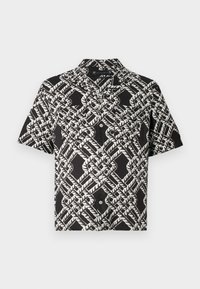 Black short-sleeve button-up shirt with white abstract geometric leaf pattern and two chest pockets.