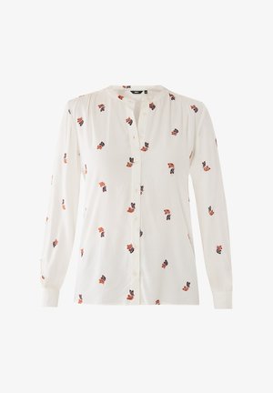 Biała bluzka z długim rękawem w małe pomarańczowe i ciemnofioletowe kwiatowe wzory, z zapięciem na guziki z przodu i okrągłym dekoltem bez kołnierzyka.
