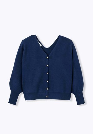 Cardigan bleu marine avec un col en V, des manches bouffantes et une fermeture à boutons avec des accents dorés. Tissu tricoté doux et texturé.