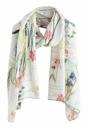 Witte lichte sjaal met roze, blauwe en gele bloemenprints en delicate handgeschreven tekst, zacht gedrapeerd met geschulpte randen.