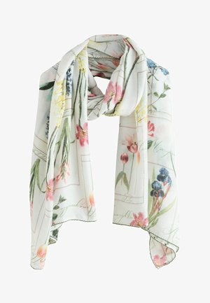 Witte lichte sjaal met roze, blauwe en gele bloemenprints en delicate handgeschreven tekst, zacht gedrapeerd met geschulpte randen.