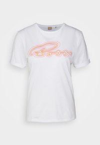 White cotton t-shirt with a round neckline and rolled short sleeves. Features a neon orange and pink cursive logo on the front.