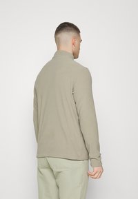 Jack Wolfskin TAUNUS HZ M - Fleecejacke - misty green