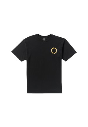 Sort bomulds t-shirt med rund hals, korte ærmer og et cirkulært gult grafisk print på venstre bryst. Blød tekstur, afslappet pasform.