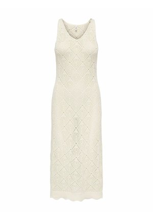 Ermeløs kremfarget strikket midi-kjole med V-hals og diamantformet hulmønster over hele kjolen.