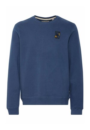 Blue sweatshirt made of soft fabric, featuring a round neckline, ribbed cuffs, and an embroidered logo on the chest. Smooth texture.