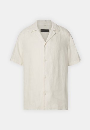 Short-sleeve shirt in natural linen, cream color, button-down front, classic collar, relaxed fit, textured fabric with soft drape.