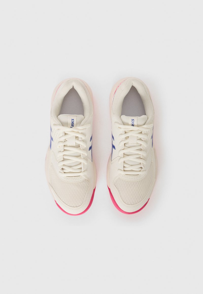 White athletic shoes with mesh upper, light purple accents, and a pink rubber sole. Features laces and a padded tongue for comfort.