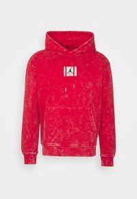 Sudadera con capucha roja, con un acabado texturizado, bolsillo canguro frontal y un parche de logo que presenta un gráfico en silueta en el pecho.