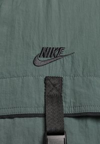 Nike Sportswear Lehká bunda - dark green
