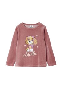 Pink velour long-sleeve shirt featuring a cartoon dog with a brown coat, wearing pink accessories, and the name "Stella" in white script below.