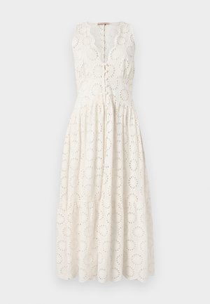 Balta bez piedurknēm kleita ar izgrieztiem apaļiem rakstiem, slāņota svārku daļa un pogu aizdare priekšā. Kokvilnas audums, līdz ceļgaliem.