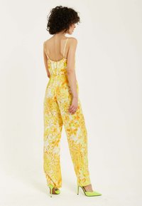 Liquorish AND ORANGE FLORAL PRINT V-NECK  - Jumpsuit - yellow