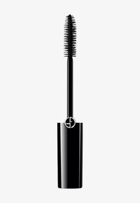 Svart mascara med en teksturert bustebørste, plassert i et strømlinjeformet svart rør med et sølvfarget logo. Rent design, blank finish.