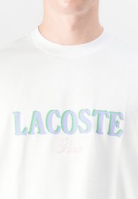 Lacoste Tričko s potlačou - white