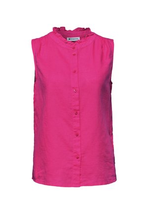 Blouse rose vif sans manches avec col à volants et fermeture boutonnée à l'avant.