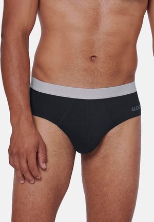 Schwarze Baumwollslips mit einem grauen elastischen Bund und Flachnähten. Mit einem Logo auf der linken Vorderseite. Weiches Material, konturierte Passform.
