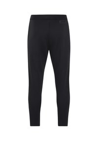 Zwarte sportleggingen gemaakt van een rekbaar materiaal. Kenmerken zijn een gladde textuur, een slanke pasvorm en een klein JAKO-logo op de tailleband.