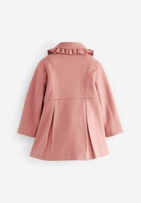 Pink wool coat with a ruffled collar, long sleeves, and pleated back design. The texture appears soft and warm.