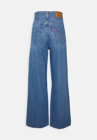 Levi's® HIGH LOOSE - Calças de ganga à boca de sino - are you ready