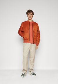 Calvin Klein HERO  - Bomberjacks - terracotta rust