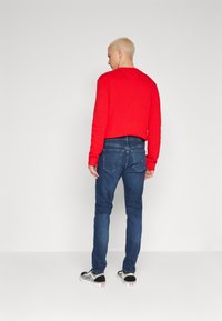 Tommy Jeans AUSTIN SLIM - Blugi slim fit - denim dark