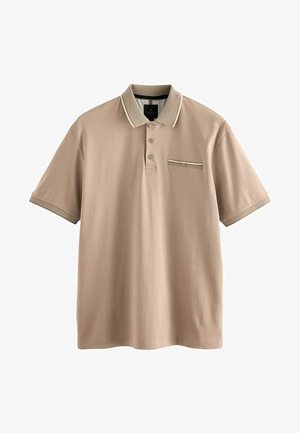 Beez värvi polo särk, mis on valmistatud pehmest materjalist, millel on mesitaru tekstuuriga krae, kolme nupuga nööpide rivi ja trimmi detailiga rinna tasku.