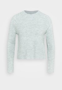 Ljusrgrön, kort tröja med långa ärmar, ribbad textur och rund halsringning. Tyget verkar mjukt och något texturerat.