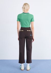 KAVU PERI - Tygbyxor - coffee