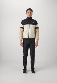 Sergio Tacchini - LIBERA SET - Verryttelypuku - black/pearled ivory Pienoiskuva 1