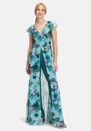 Blumenkleid im Maxiformat in Schattierungen von Türkis, Grün und Lila. Verfügt über Flatterärmel, einen tiefen V-Ausschnitt und einen Schlitz vorne zur Betonung.