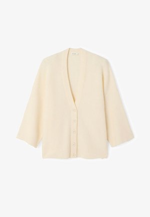 Cardigan écru côtelé avec un décolleté en V profond, six boutons sur le devant et des manches larges, fabriqué en tissu doux et texturé.