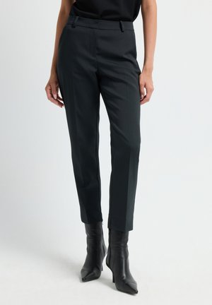 WITH SIDE POCKETS AND SLIT LEGS - Chino - black