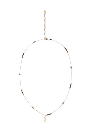 Delikatny złoty naszyjnik łańcuszkowy z małymi fioletowymi koralikami rozmieszczonymi równomiernie oraz złotą zawieszką w kształcie symbolu nieskończoności na środku.