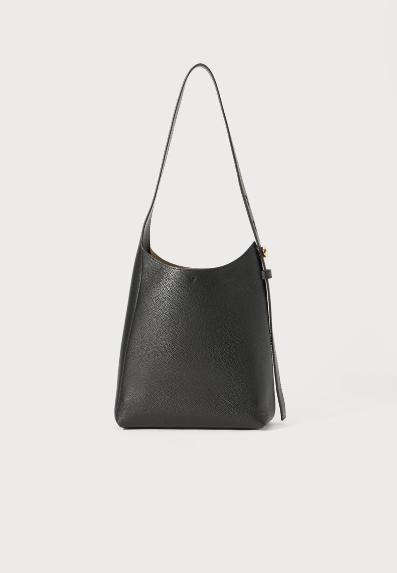 Black leather handbag with a smooth texture, curved silhouette, and a long shoulder strap. Features a subtle gold-tone hardware accent.