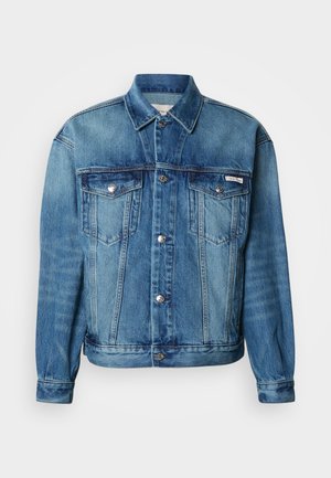 Šviesiai mėlynas džinsinis švarkelis su smailiu apykakliu, priekiniais sagų užsegimais, dviem krūtinės kišenėmis ir ilgomis rankovėmis su sagų rankogaliais.