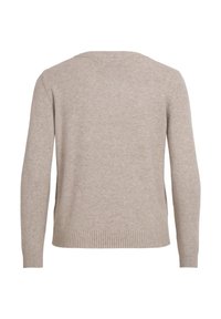 Beige stickad tröja med rundad halsringning, ribbade mudd och nederkant. Mjuk textur med en slät finish, med en enkel design utan utsmyckningar.