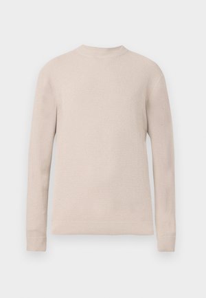 Beige Strickpullover mit rundem Halsausschnitt, langen Ärmeln und gerippten Bündchen und Saum. Strukturmuster über den gesamten Stoff.
