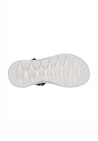 Suela de zapato de goma blanca con un patrón de agarre texturizado y formas ovaladas. Diseño limpio con bordes curvados para mayor comodidad ergonómica.