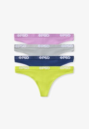 Junge Frau mit langen dunklen Haaren, die einen neongelben Sport-BH und passende Unterhosen mit weißen PSD-Logo-Bändern vor einem einfarbigen Hintergrund trägt.