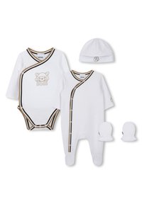 White baby clothing set including a bodysuit and romper with black and brown striped accents, a knit hat, and matching mittens.