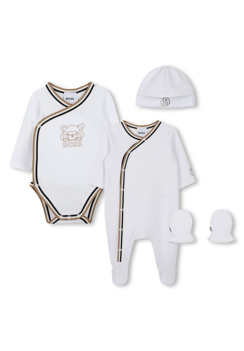White baby clothing set including a bodysuit and romper with black and brown striped accents, a knit hat, and matching mittens.